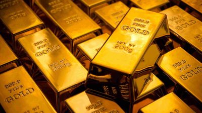 Stacked gold bars symbolizing renewed investor interest in safe-haven assets