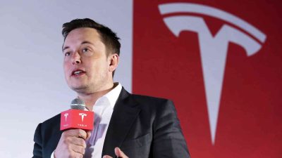 Elon Musk presenting Tesla’s vision for self-driving vehicles and AI systems